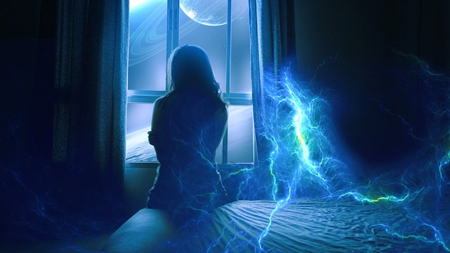 woman sitting on a bed with lightning and electric energy around her